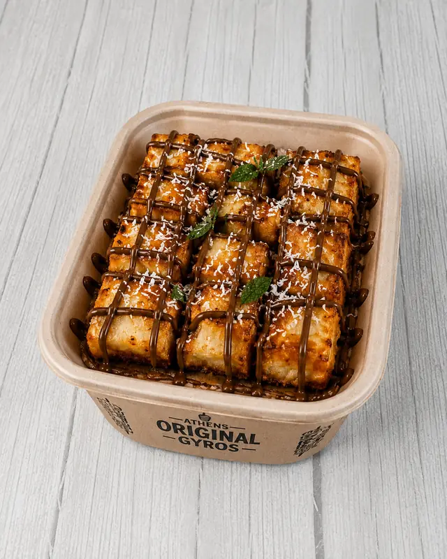 Sweet treat drizzled with honey on a serving tray