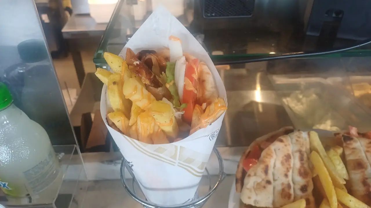 A gyros cone served over the counter